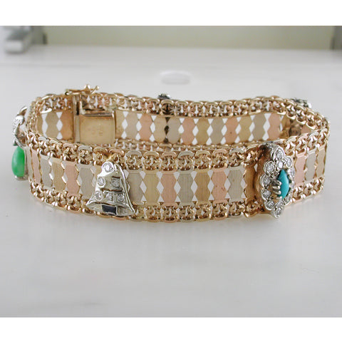 All of our estate items are completely inspected, cleaned, and polished by our master jeweler to insure you are buying a heirloom which will be wearable the moment it arrives. This is a certified pre-owned and antique item, and some wear is to be expected and is characteristic.         18K Yellow Gold & Sterling Silver .925     1.5" wide     2.25" wide center opening     Weighs 45.34 grams     High polish finish     Hand engraved designs     Hallmarked Barnaby Sterling 18K 87106  Call (203) 989-4122 or emai